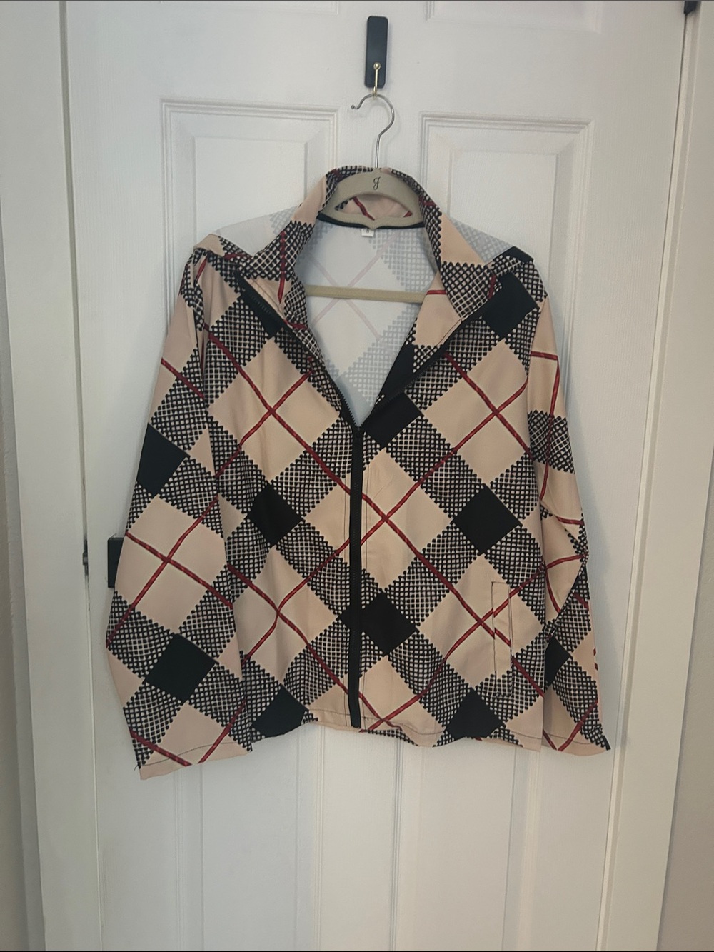 Beige Plaid Zip Bomber Jacket with Black & Red Accents. Measures 27”L x 42” W.
